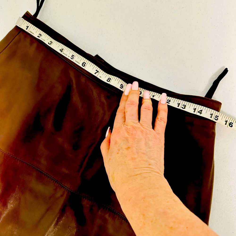 REDUCED! Chocolate brown leather pencil skirt. Fits a medium. Says 14. Not.